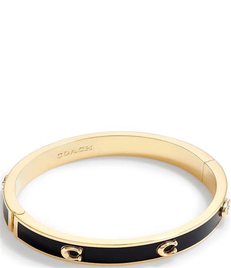 coach kissing c hinged bangle|coach signature logo hinged bangle.